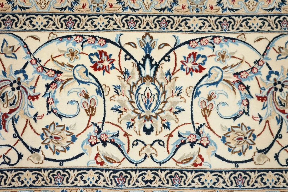 Handmade rug with fine floral borders