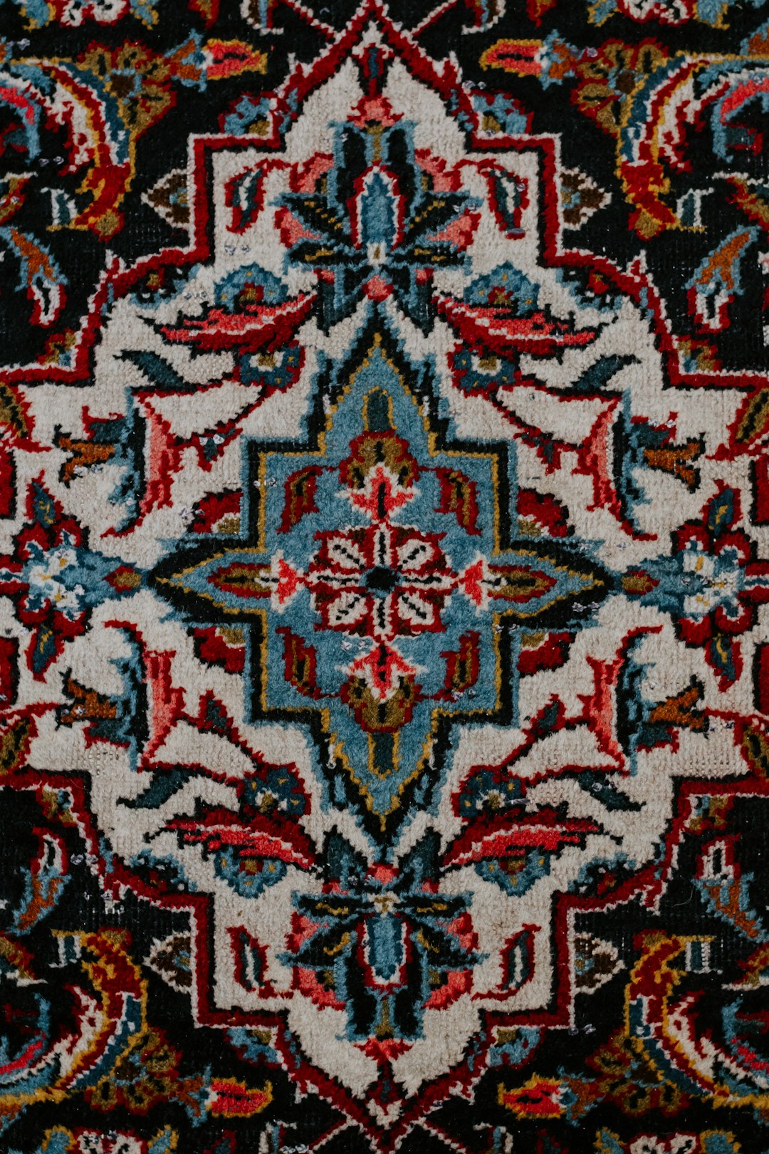 Floral textile detail of handmade carpet